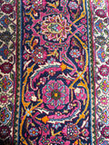Close-up of palmette design in ornate rug border