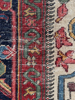 Close-up of inner border band with intricate designs and colors.