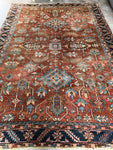 Early 20th century Heriz rug featuring geometric floral patterns