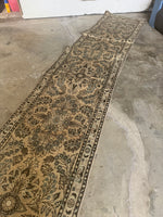 Soft-toned Persian runner suitable for staircases.