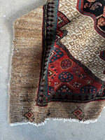 Antique Persian runner in wool and camel hair.