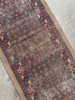 Antique Persian Seraband rug with dainty heart border details.