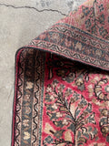Underside view of 1930s Persian Sarouk rug in nice condition with sheen.