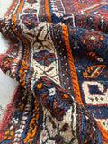 Texture view of soft vegetable dyed wool with relaxed floppy handle.