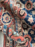 Close up view of Decorative antique Persian Veramin rug with all-over Mina Khani floral design and sturdy structure.