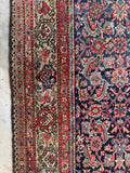 Navy field antique Mahal rug with natural vegetable dyes.