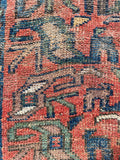 Close up of hand knotted Persian scatter rug with tribal floral motifs, late 1800s antique wool rug.