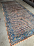 Soft and luxurious Persian rug with a glowing sheen and vegetable-dyed colors