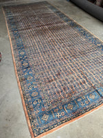 Soft and luxurious Persian rug with a glowing sheen and vegetable-dyed colors