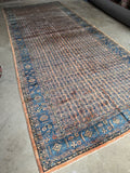 Soft and luxurious Persian rug with a glowing sheen and vegetable-dyed colors