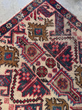 Caucasian accent rug in bone ivory and French blue, perfect for high-traffic entryways.