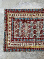 Fence of security border design on an antique Mahal runner.