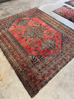 Full view with spandrel design mirroring diamond medallions in Afshar rug.