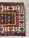 worn antique Caucasian runner handmade with vegetable dyed wool.