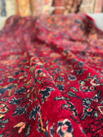 Soft, densely piled antique Lilihan rug.