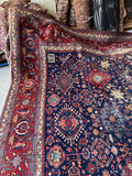Corner of rug draped showing sharp design transitions.