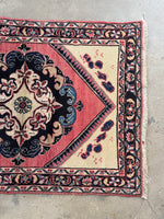 Romantic style Persian rug medallion surrounded by ivory ground.