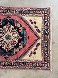 Romantic style Persian rug medallion surrounded by ivory ground.