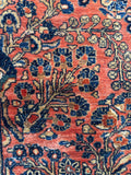 11x21 salmon pink Persian Sarouk rug with intricate floral artwork.
