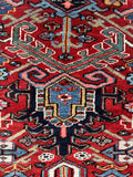 Close-up of angular northwest Persian motifs woven with natural vegetable dyes.