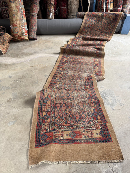 Long vintage Persian runner perfect for hallway or passage styling.