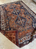 Underside view of tribal Persian rug from Southwest Persia with three connected medallions.