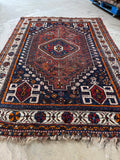 Overall view of Persian tribal Shiraz rug woven circa 1940.