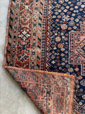Border band with repeating geometric tribal motifs and view of underside.