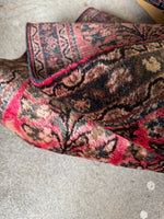 Silky sheen Sarouk rug with smooth wool texture.