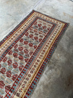 Persian Mahal runner featuring boteh paisley motifs in rows.