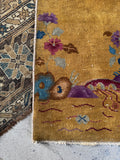 1920s Chinese rug with cool blue, lavender, and burgundy accents.