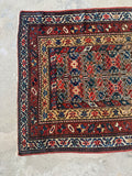 3x6 rust red small Persian rug.