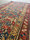 3x6 small antique rug.