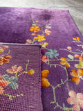 Underside view of rug showing weave and secured sides.