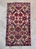 Small Caucasian rug 1'10 x 3'3 showcasing authentic nomadic mountain weaver craftsmanship.