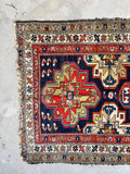 Small area rug with bold tribal energy.