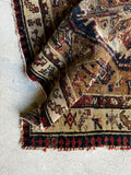 Hand-knotted Caucasian scatter rug with vegetable-dyed wool