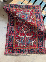Antique 1930s NW Persian scatter rug with bold geometric tribal design and natural vegetable dyes

