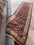 Vegetable dyed wool antique runner top-view shot capturing the natural color variation and vibrant vegetable dyes.