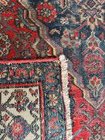 Underside view of soulful antique Persian Bibikabad runner with strength, character, and rare proportions.