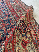 Pistachio green main border with stylized botanical motifs.