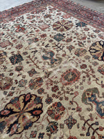 Middle of rug with clear view medallions and botanical motifs.