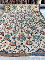 Floor-ready antique rug with vibrant colors and intact integrity.