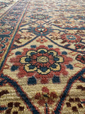 Texture view of handwoven wool dyed with natural plant-based colors.
