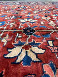 Texture detail of even wool pile on antique Persian Tabriz rug.