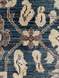 Closeup of marbled teal and slate blue wool in the field.