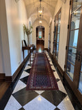 Slim antique Persian rug ideal for dressing up a long skinny hall.