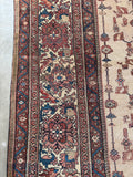 Persian Mahal rug with wide dark blush, indigo, teal, and camel floral borders.