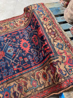 Handmade vintage Kurdish rug crafted with natural dyes.