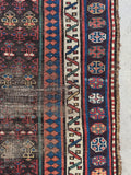 Antique tribal Persian runner with naturally aged vegetable dyes, geometric design, with some scattered wear.